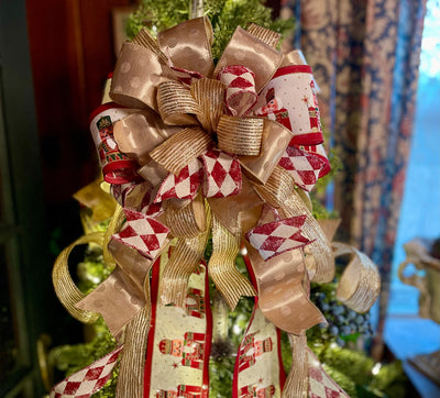 The Neve brick red & gold Christmas Tree Topper Bow