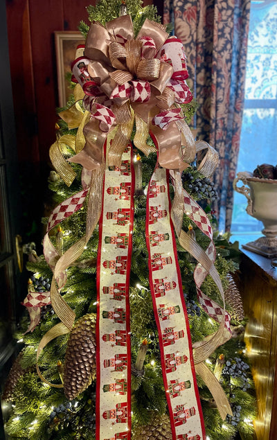 The Neve Gold Nutcracker Christmas Tree Topper Bow