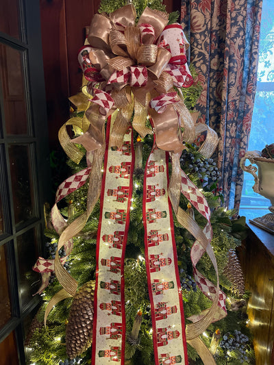 The Neve Gold Nutcracker Christmas Tree Topper Bow