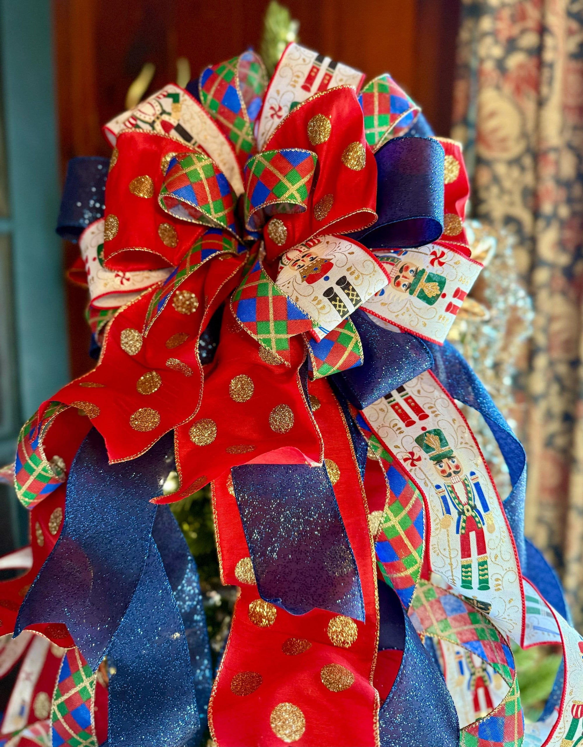 The Rockefeller Navy Red & Gold Nutcracker XXXL Christmas Tree Topper Bow, Christmas tree trimming bow, XL long streamer bow, Luxury Bow