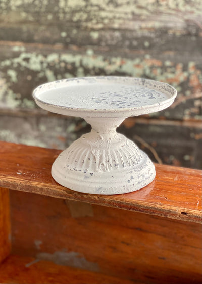 The Rebecca White Distressed Metal Pedestal Candle Stand