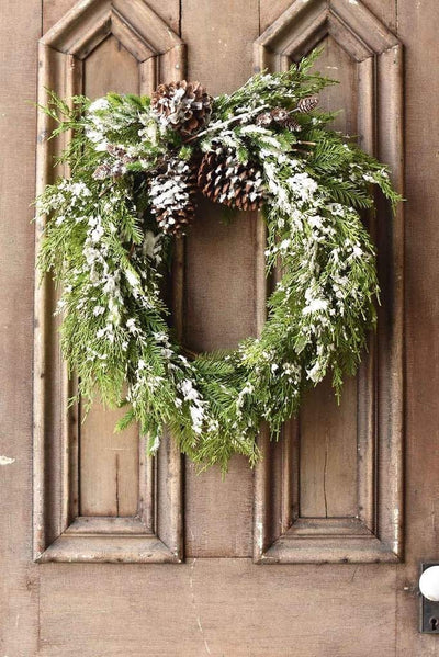 The Shioban Faux Snowy Mixed Pine Oval Christmas Wreath For Front Door
