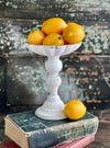 The Latisha White Distressed Metal Pedestal Candle Stand