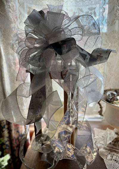 The Donner Silver & White Christmas Tree Topper Bow