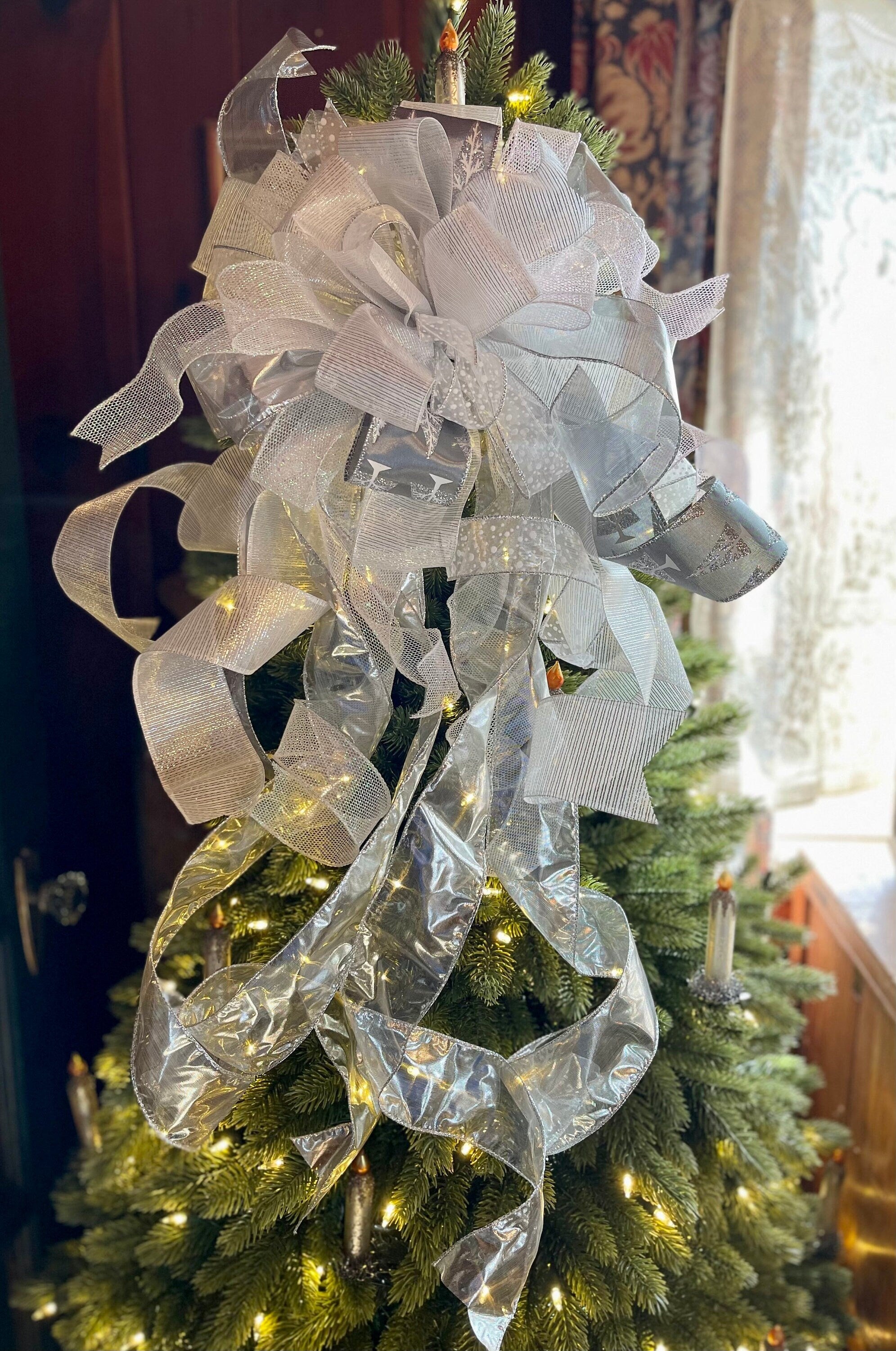 The Donner Silver & White Christmas Tree Topper Bow